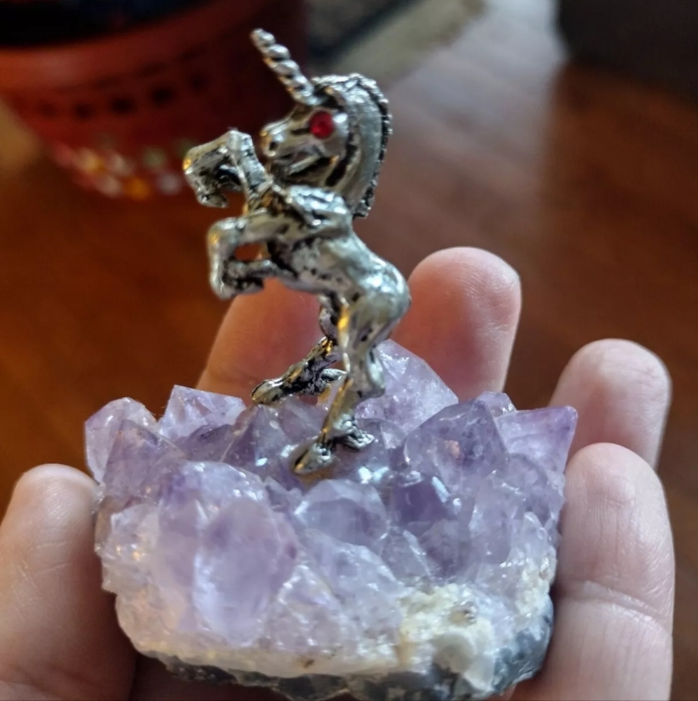 Vintage unicorn on amethyst crystal